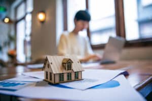 homeowner-working-on-laptop-insurance-concept